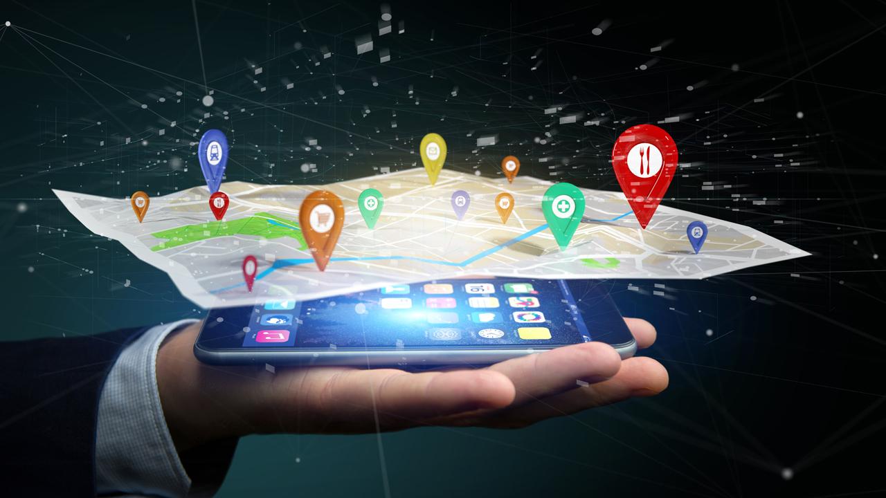 Businessman holding a 3d rendering pin holder on a map