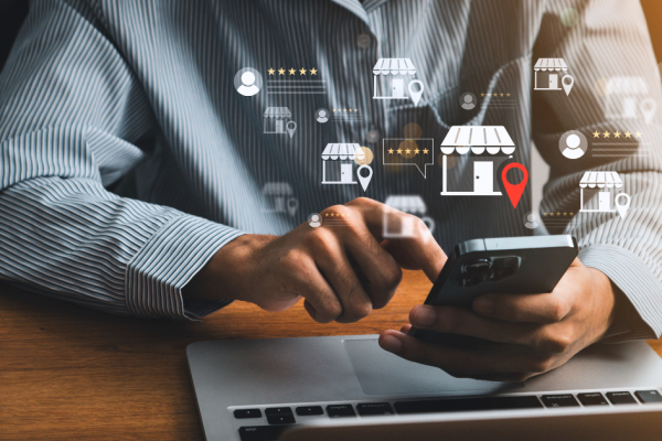 A business owner checks his online reputation and listings across multiple platforms on the Internet.