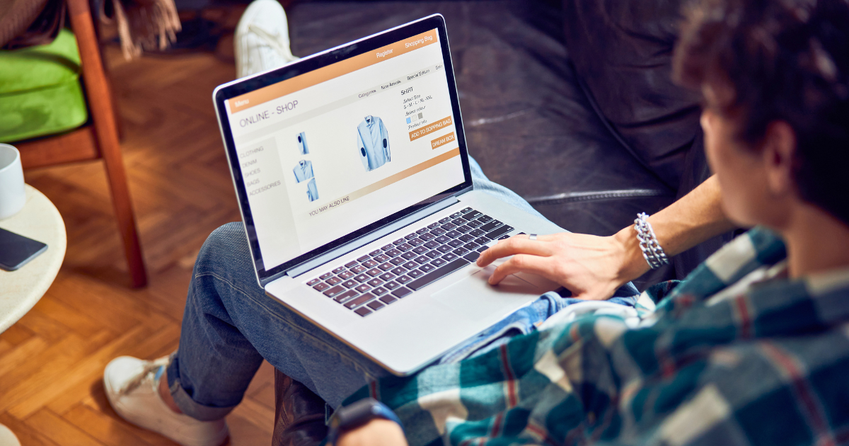 A young man shops for clothes online. If he doesn't make a purchase, he will be retargeted with an ad.