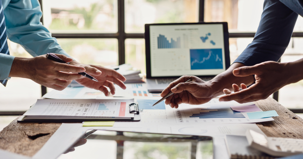 Two business people discuss the how their marketing budget allocation for 2027.